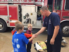 Bake cookies for a local fire station or police department