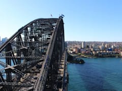 Take a scenic walk along the Sydney Harbour Bridge and enjoy the stunning views of the city