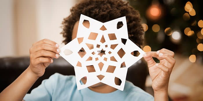 Make paper snowflakes