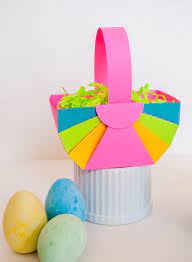 Create Easter baskets with construction paper and ribbon