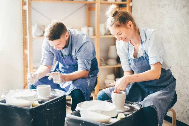 Couples pottery class at a studio