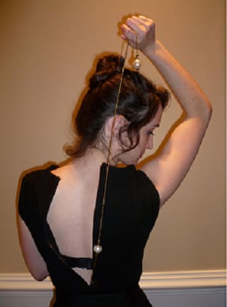 Use a string to zip up the back of your dress