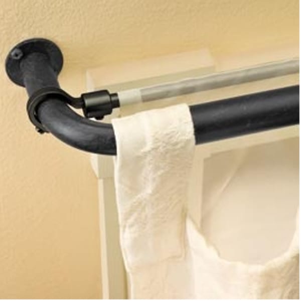 Instantly hang a second panel behind curtains using a bungee cord