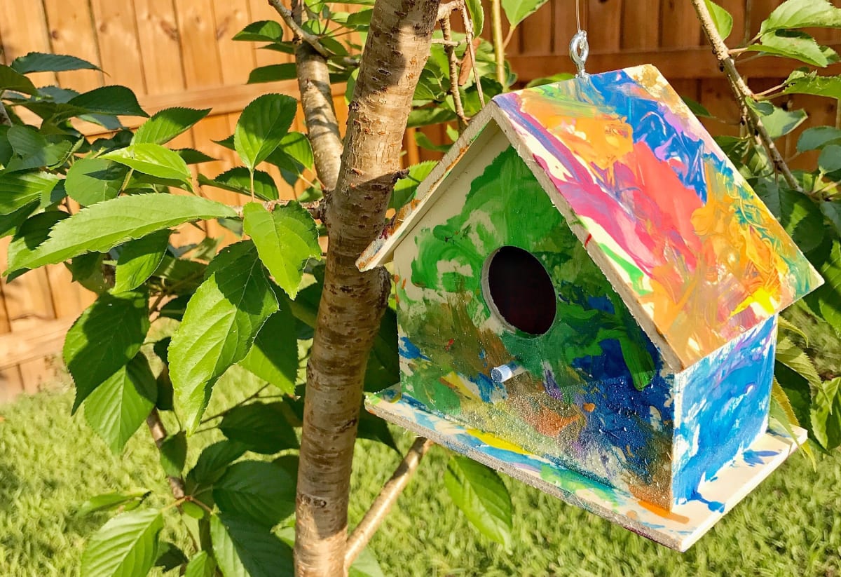 Paint wooden birdhouses