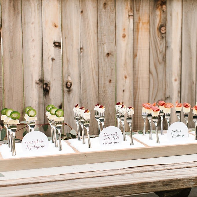 Cheese selection served on silver forks