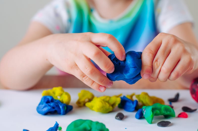 Easter-themed playdough with cookie cutters and plastic eggs