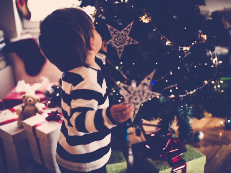 Decorate home with holiday decorations and lights