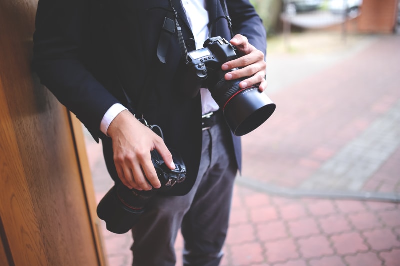 Begin researching photographer, videographer