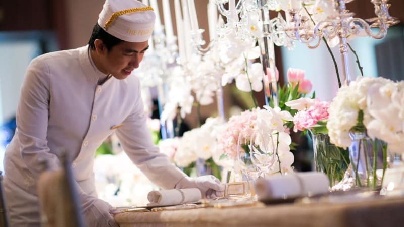 Begins looking for caterer and decide on menu