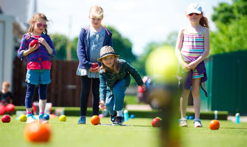 Play Lawn bowling