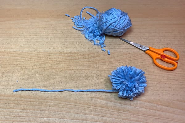 Create pom pom bookmarks