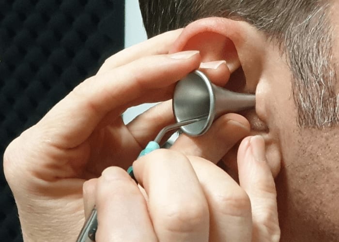 Mechanical removal of earwax