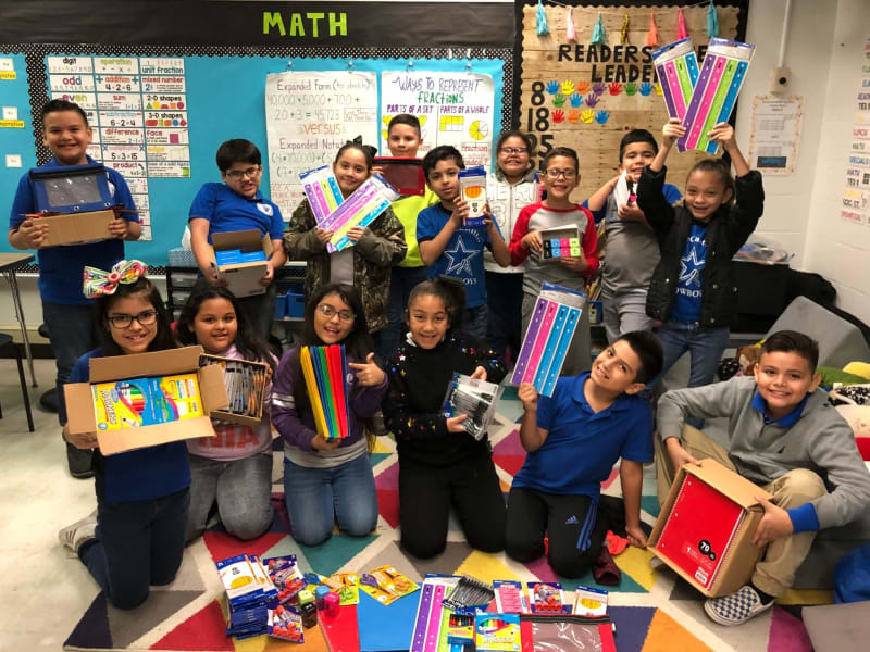 Collect and donate school supplies to a local school or charity